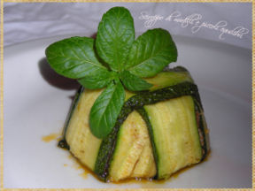 Timballetti di zucchine con cous cous al ragù di carne e piselli