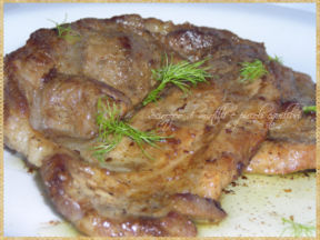 Braciole di coppa di suino alla senape di Digione, semi e barbe di finocchio