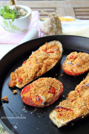 Melanzane e pomodori perini ripieni al forno