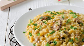 Risotto con pasta di salame, porcini e zafferano.