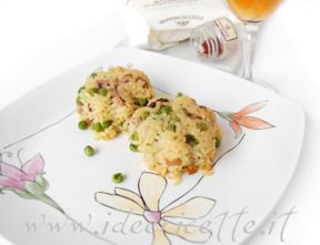 Ricetta Tortini di riso con moscardini piselli e zafferano