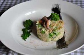 Cous cous integrale con cime di rapa e seppie