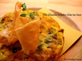 Frittata di zucchine con il fiore e cialde di grana