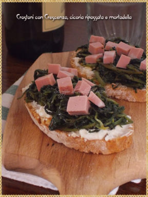 Crostoni con Crescenza, cicoria ripassata e mortadella