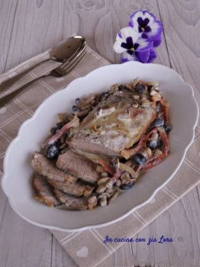 Filetto di maiale con funghi e speck